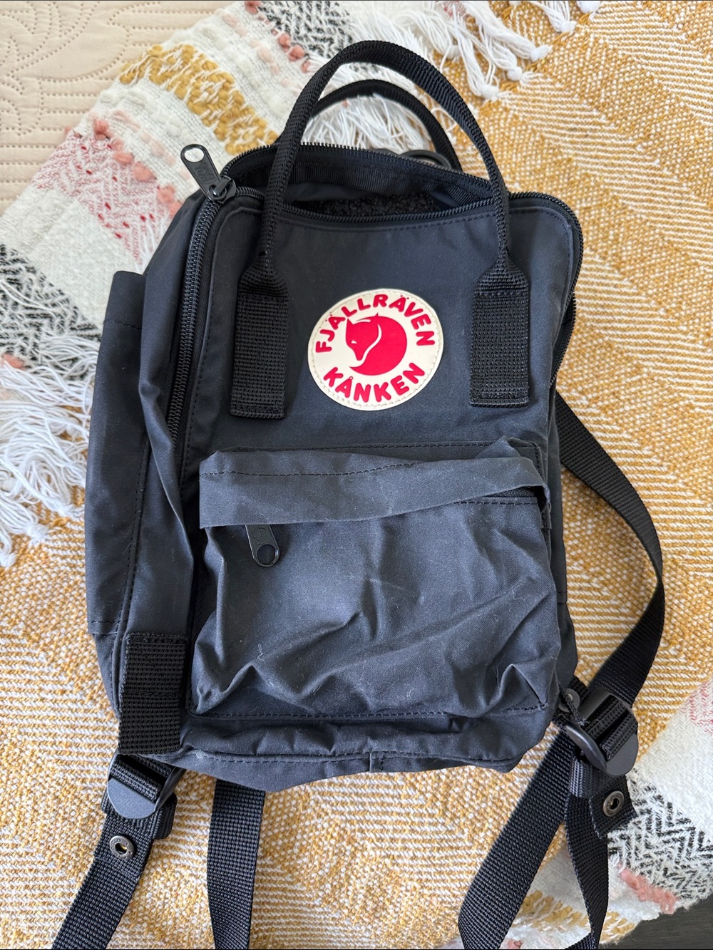 Fjallraven Kånken Mini Backpack in Black with Red Logo